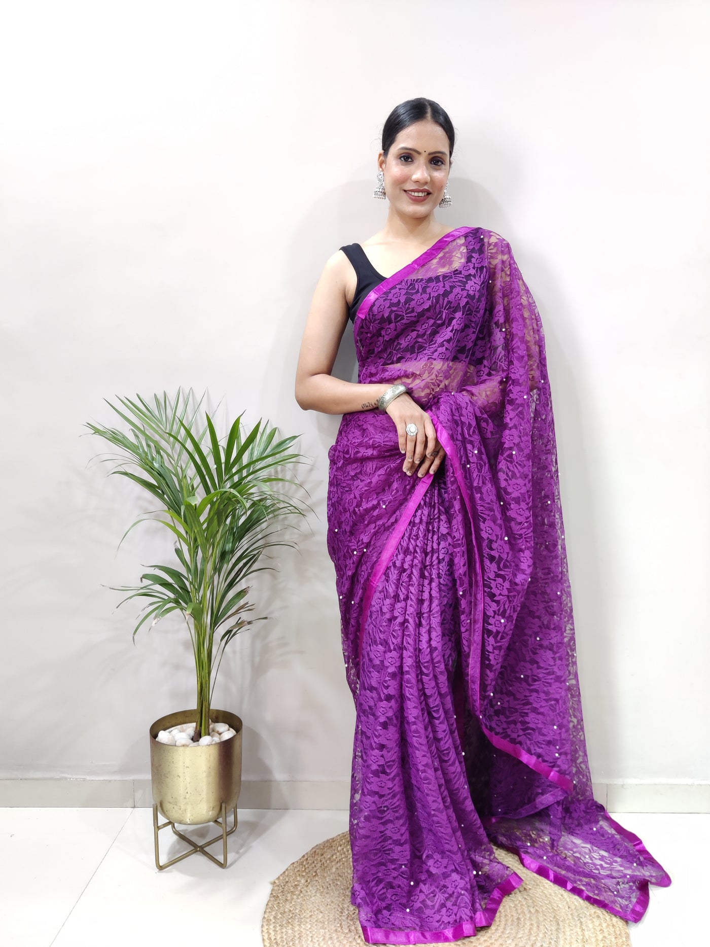 Beautiful Purple Net Brasso Saree With Running Net Blouse