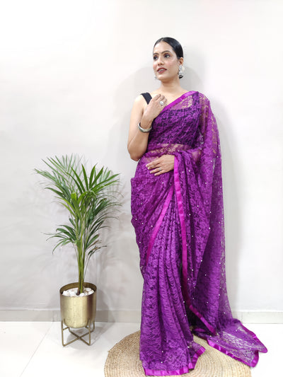 Beautiful Purple Net Brasso Saree With Running Net Blouse