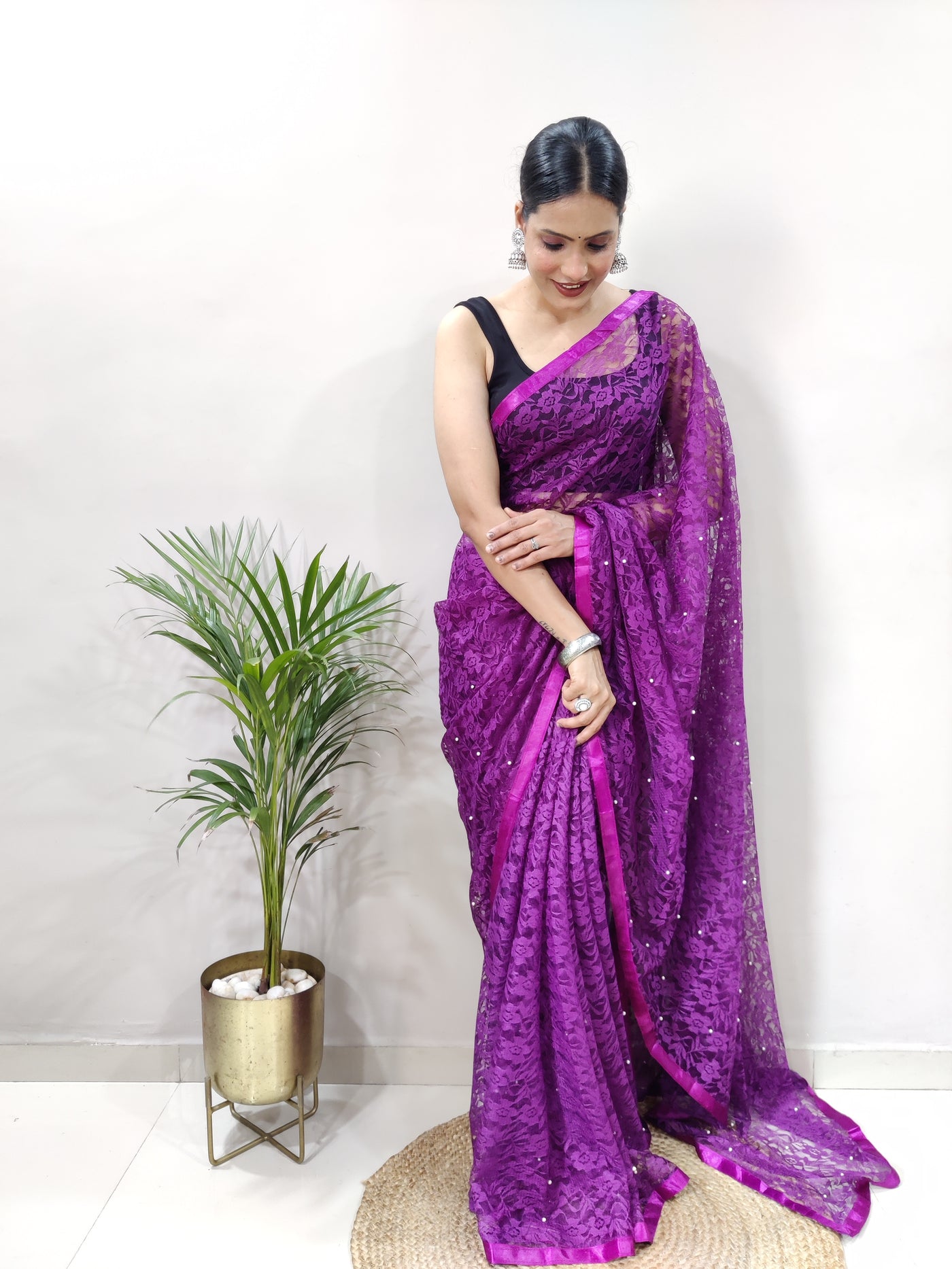 Beautiful Purple Net Brasso Saree With Running Net Blouse