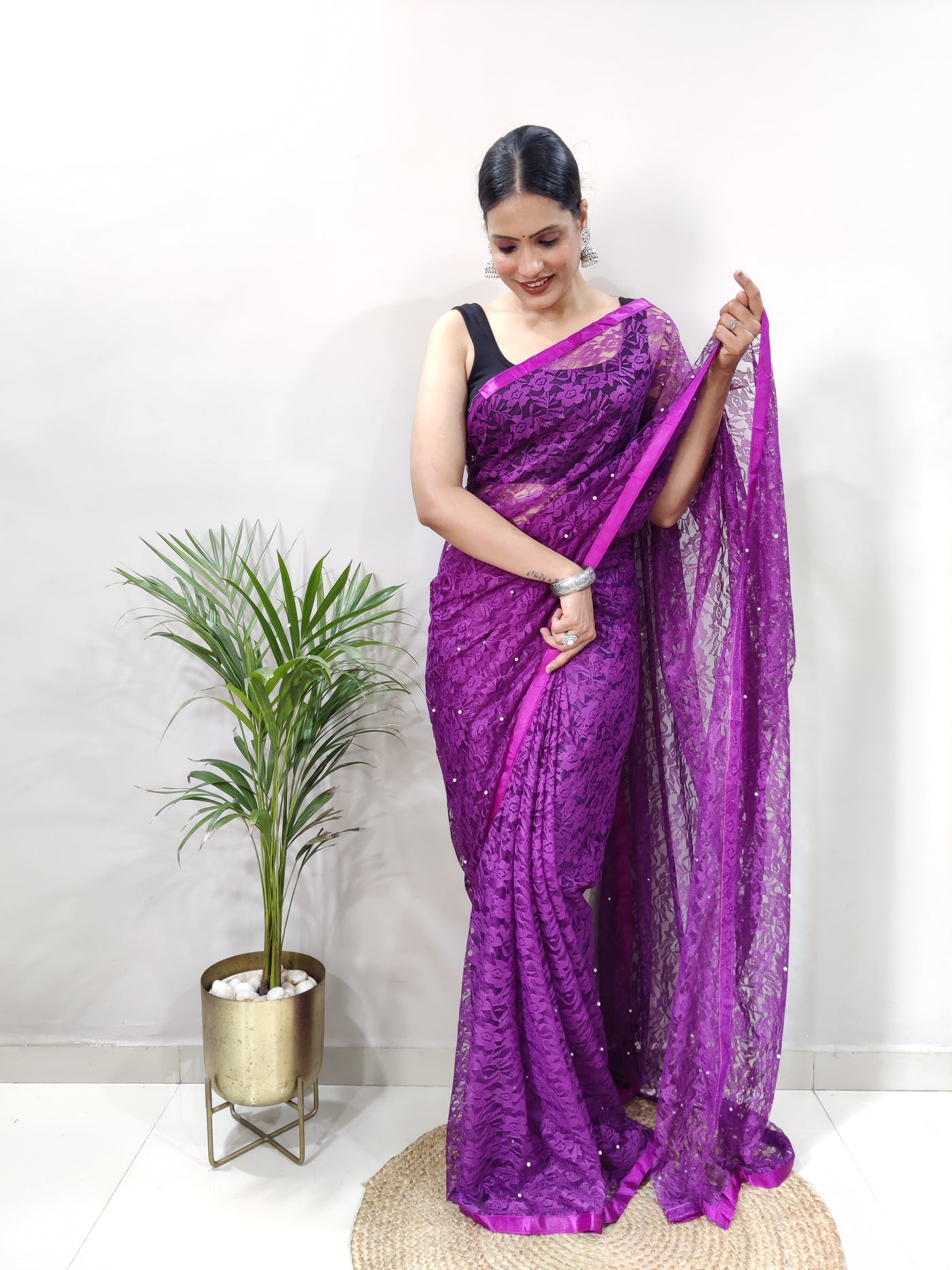 Beautiful Purple Net Brasso Saree With Running Net Blouse