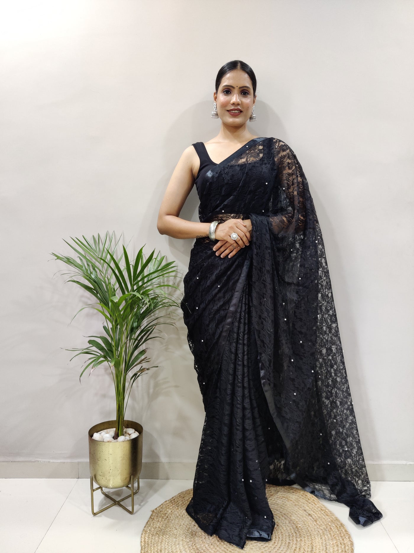 Beautiful Black Net Brasso Saree With Running Net Blouse