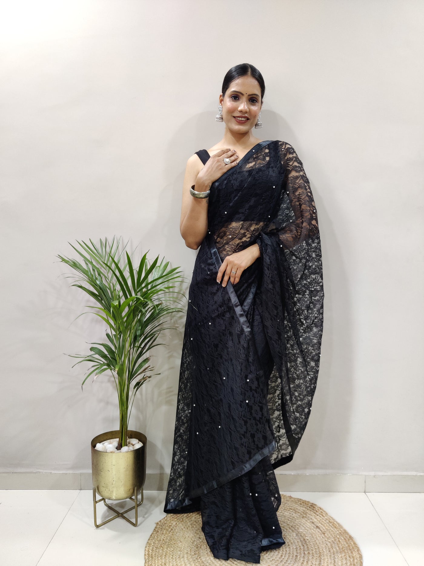 Beautiful Black Net Brasso Saree With Running Net Blouse