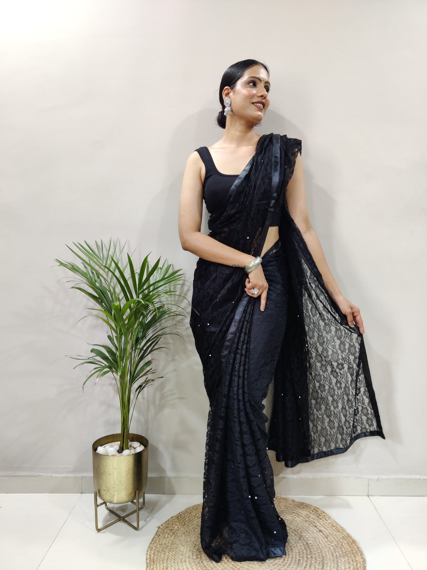 Beautiful Black Net Brasso Saree With Running Net Blouse